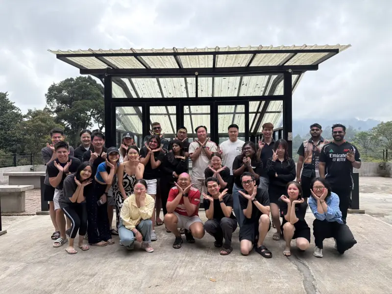 Corporate team celebrating together after a programme